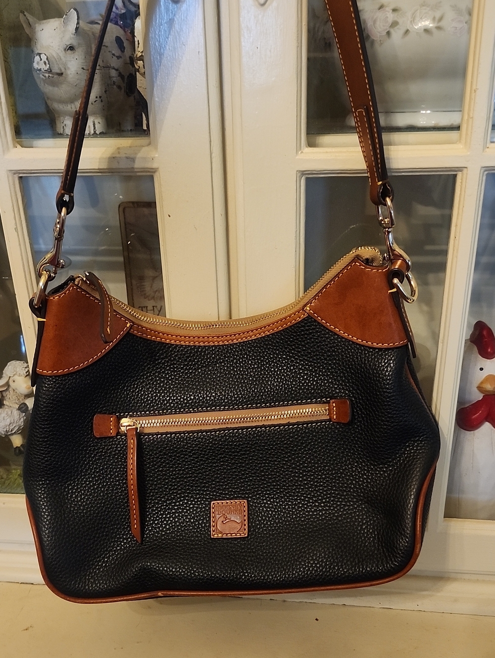 Dooney & Bourke Black Pebbled Leather Shoulder Bag with Brown Trim